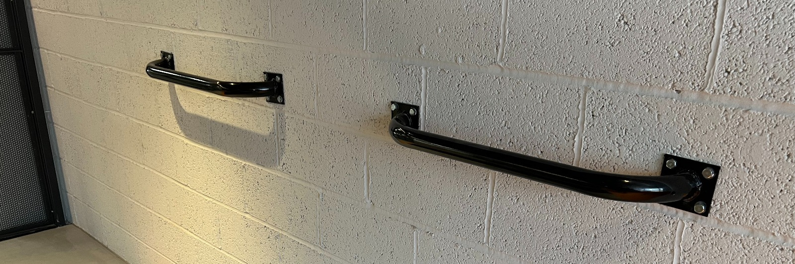 Bike Dock Solutions Wall Mounted Sheffield Bike Stand in a residential corridor